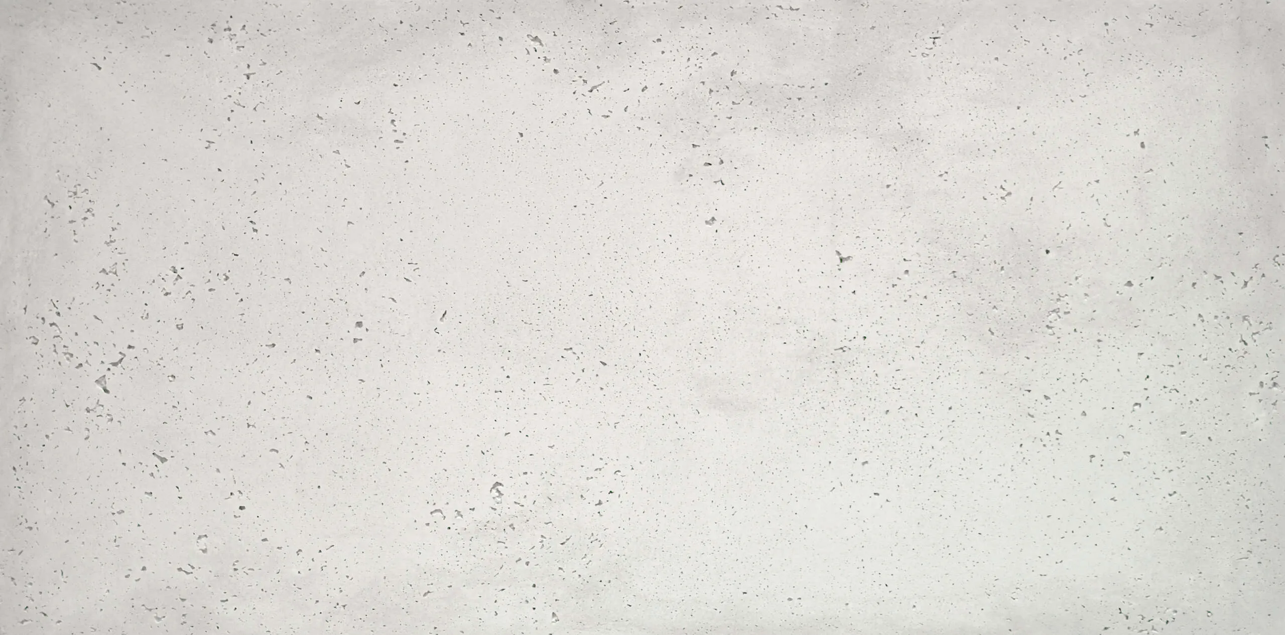 ConcreAte Pure — biały beton architektoniczny na ścianę