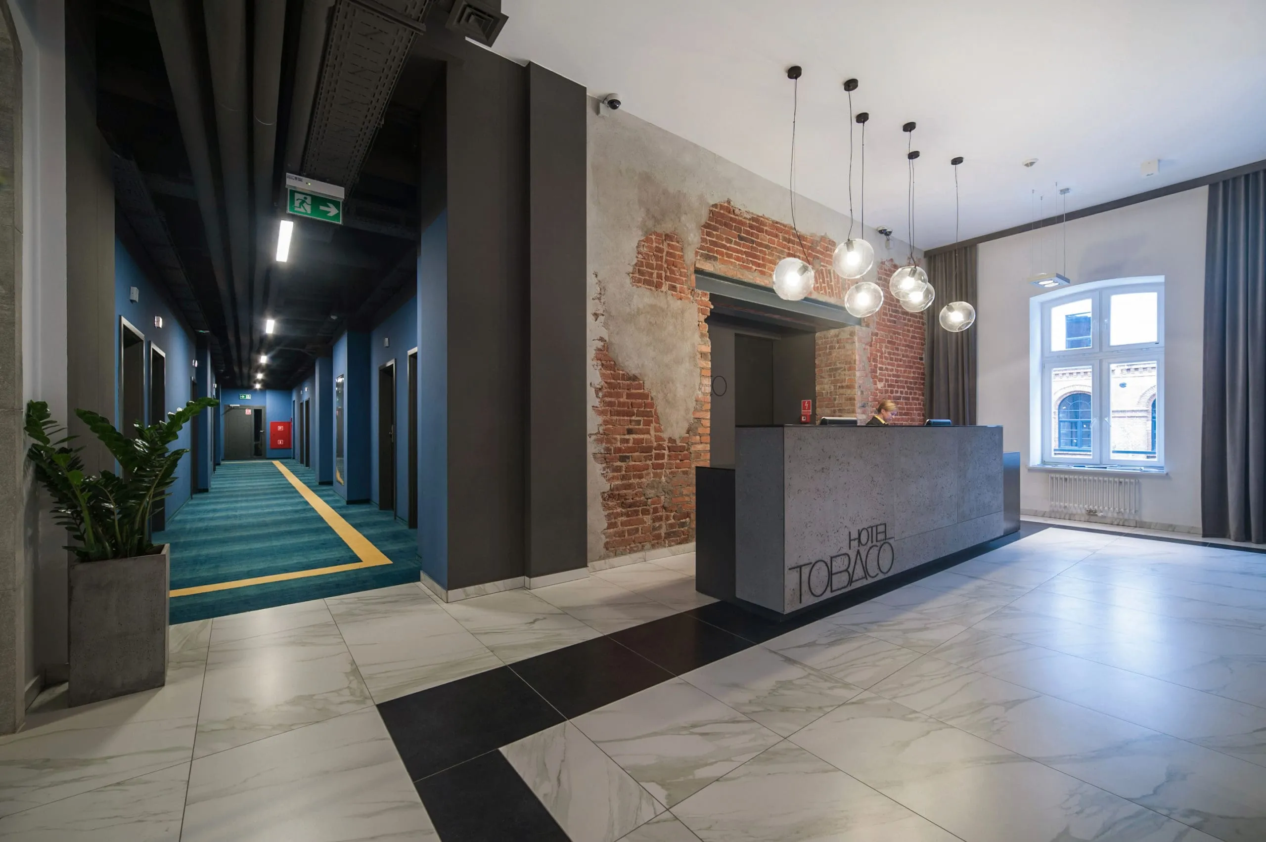 Beton dekoracyjny ConcreAte — realizacja Hotel Tobaco / Łódź