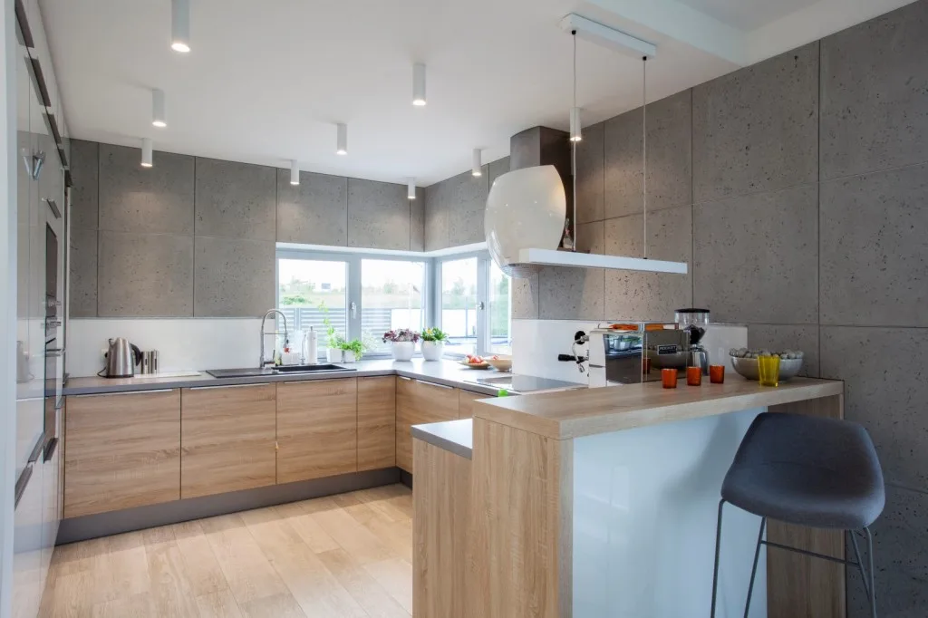 Ściana w salonie z betonu architektonicznego concreAte common wymiary standardowe 60x60 — Prywatny apartament / Łuków